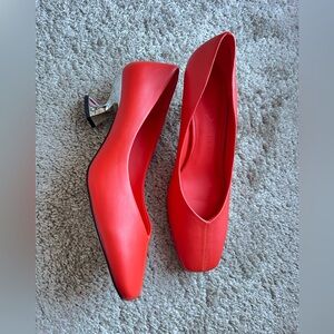 Katy Perry. New without tags. Size 10. Vibrant Orange Heels